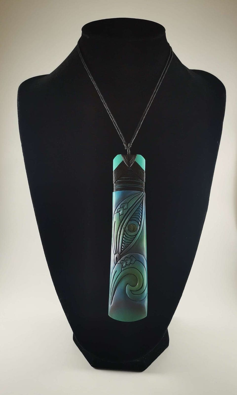 Tiki Pendant — view 1