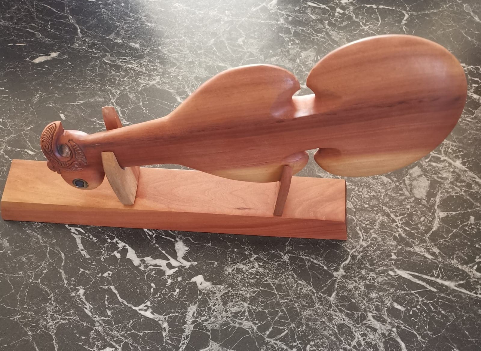 Wooden Kotiate on stand — view 1
