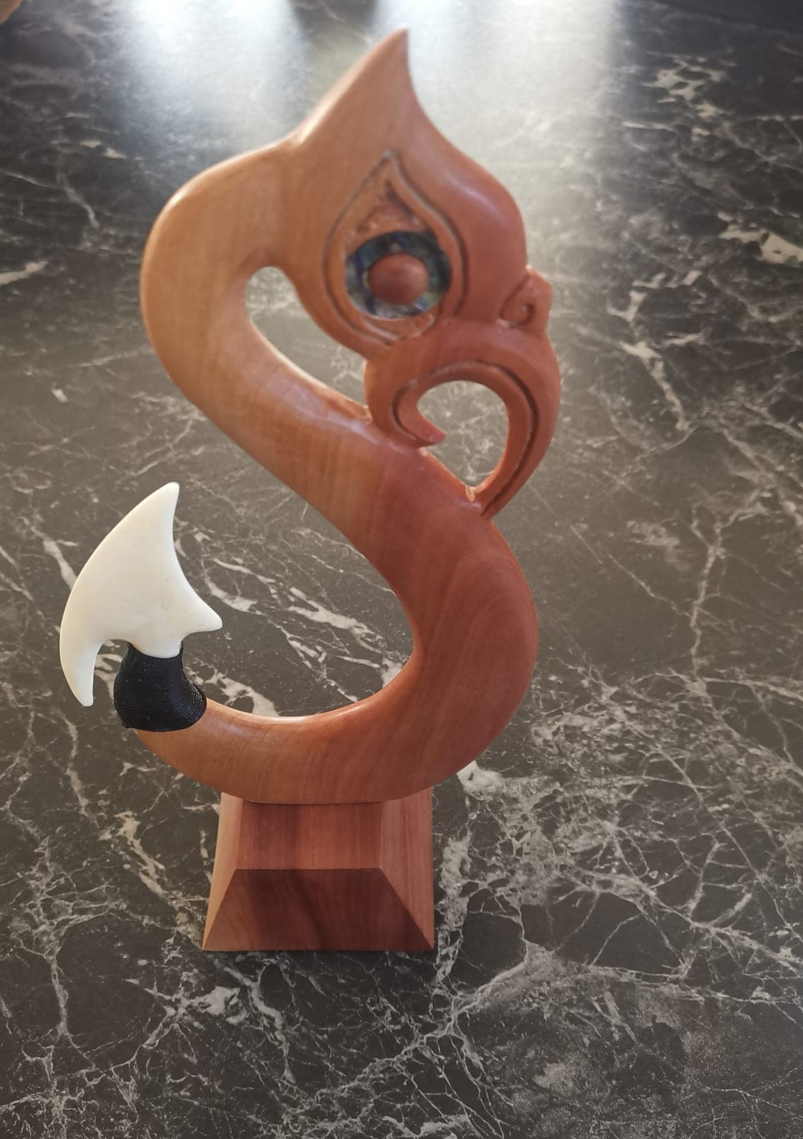Manaia Hook on stand — view 1
